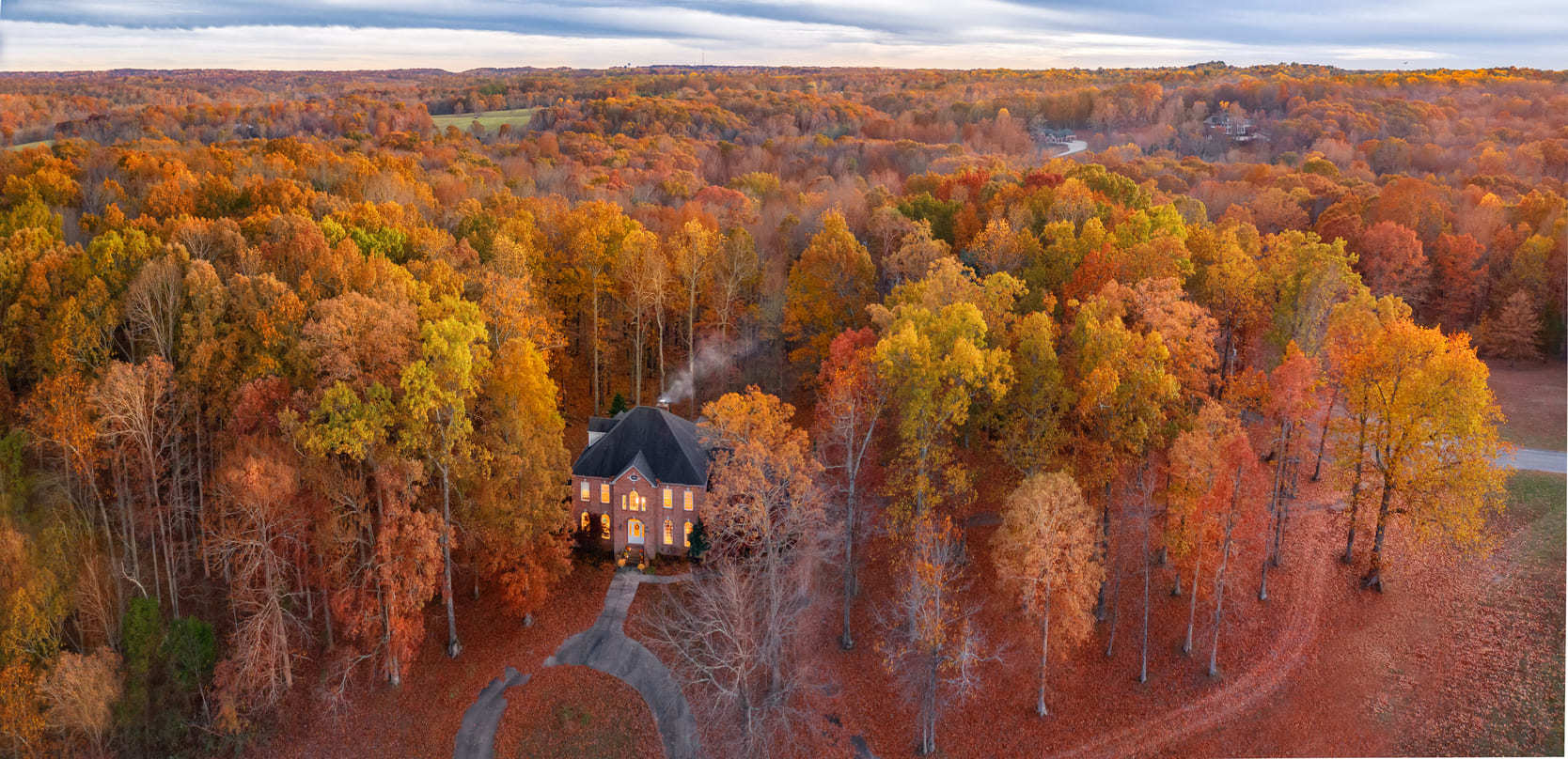 Fall foliage surrounding a beautiful cabin in Sevier County, Tennessee